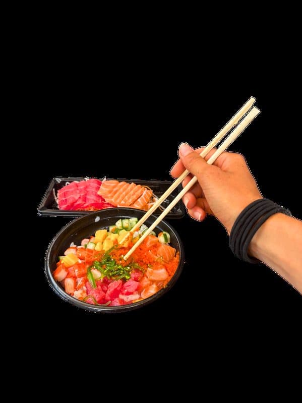 A colourful poke bowl shot on a dark background